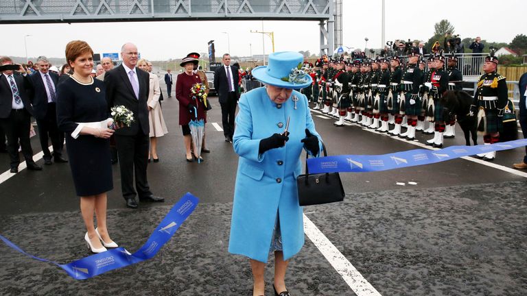 The Queen cuts the tape to open  the Queensferry Crossing over the Firth of Forth near Edinburgh
