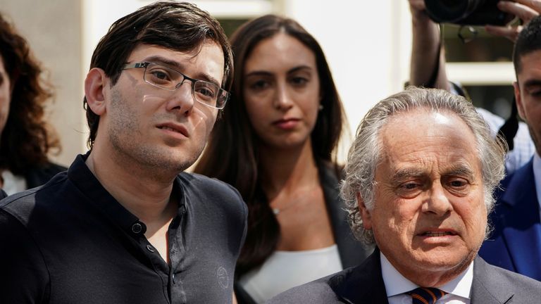 Shkreli stands with his lawyer after being convicted of securities fraud in August