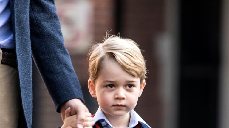 Prince George arrives with the Duke of Cambridge at Thomas's Battersea in London