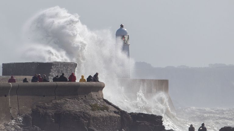 Waves break over the coastline at Porthcawl in Wales