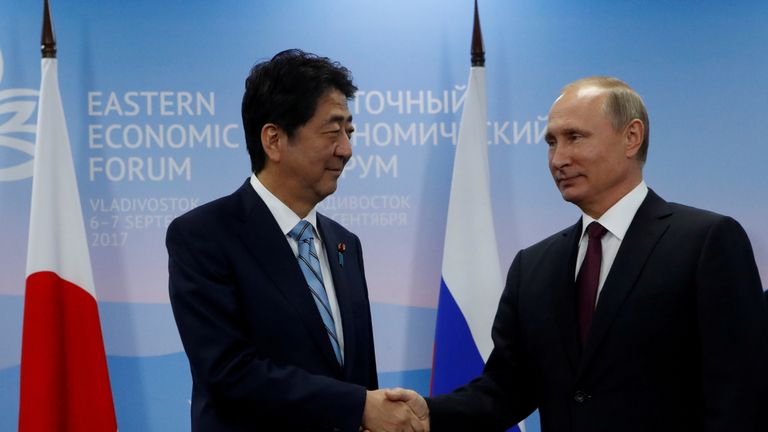 Mr Putin shared a platform with Japanese Prime Minister Shinzo Abe