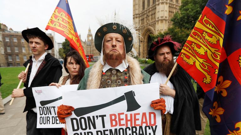 A man dressed as King Henry VIII protests outside the Houses of Parliament as MP&#39;s debate the European Union Withdrawal Bill