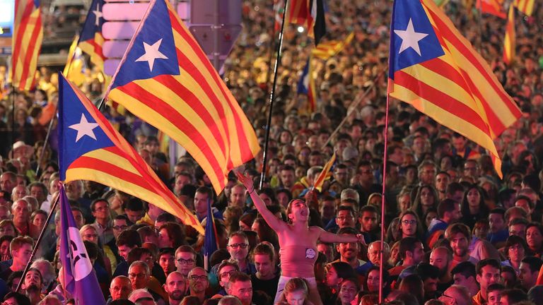 People gathered at a final pro-independence rally in Barcelona on Friday