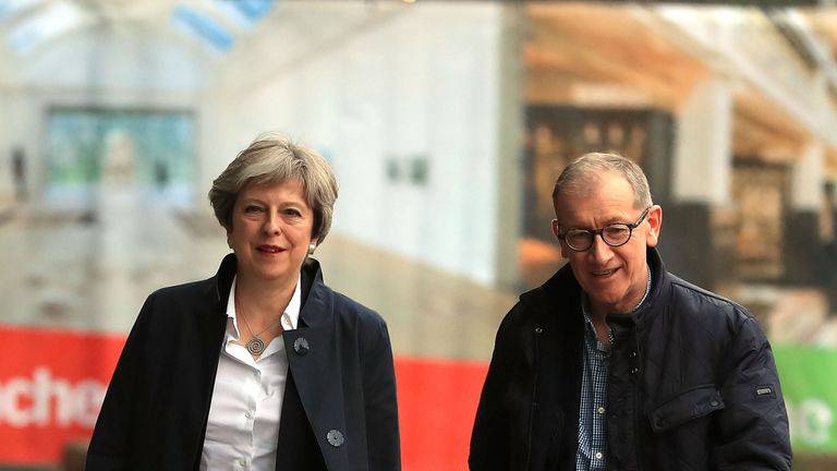 Theresa May and husband Philip arrive at the conference venue