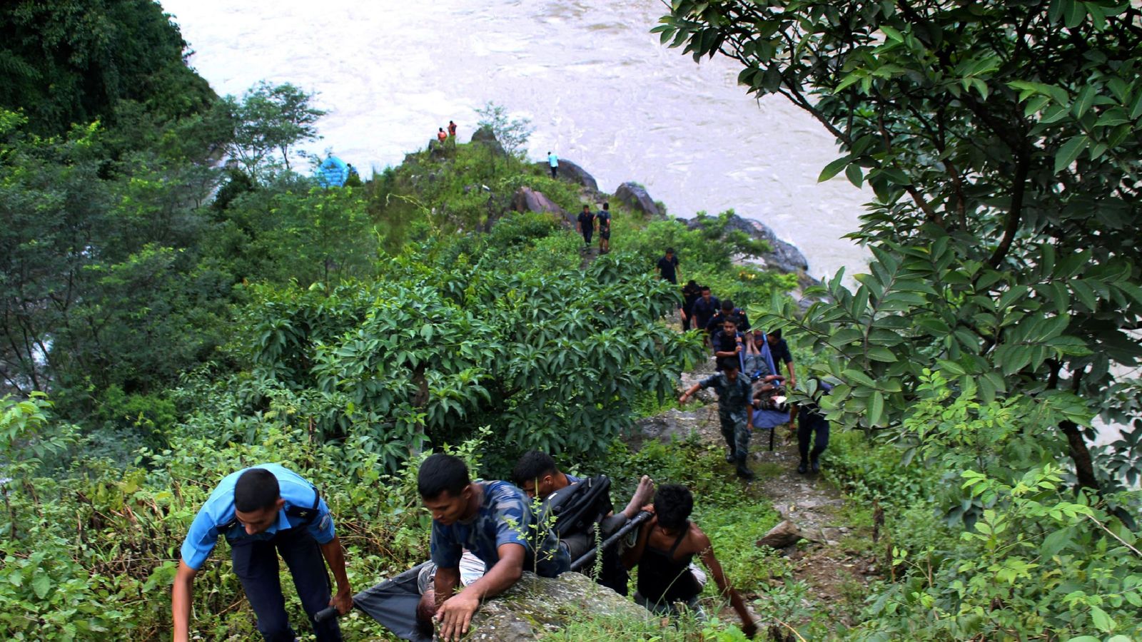 Bus plunges into river from Nepal highway killing at least 31 | World ...