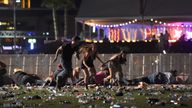 People run from the Route 91 Harvest country music festival after gun fire was heard 