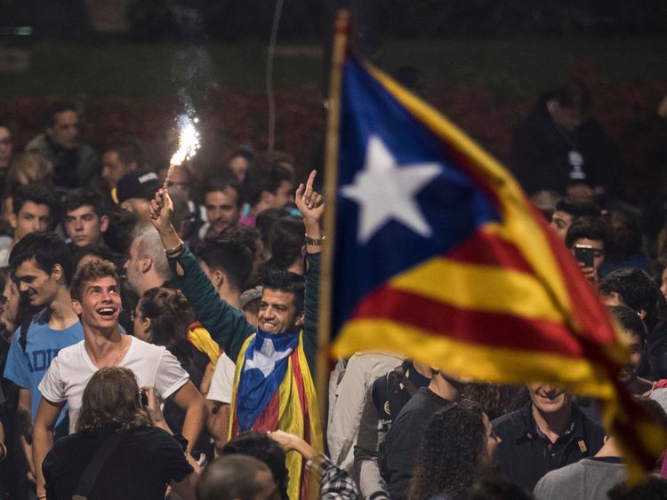 Separatists celebrate in Barcelona following the landmark vote