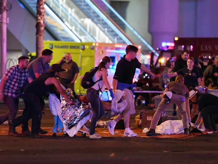  An injured person is tended to in the intersection of Tropicana Ave. and Las Vegas Boulevard