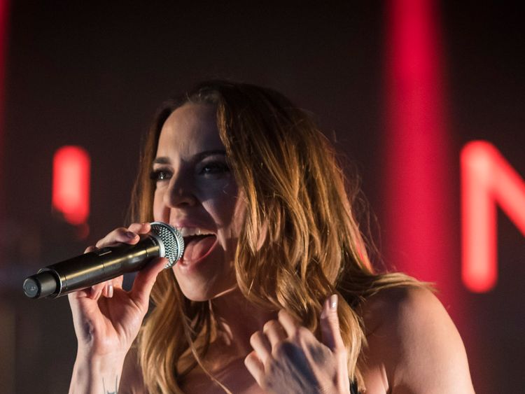 Mel C performing in her new video for Room For Love 