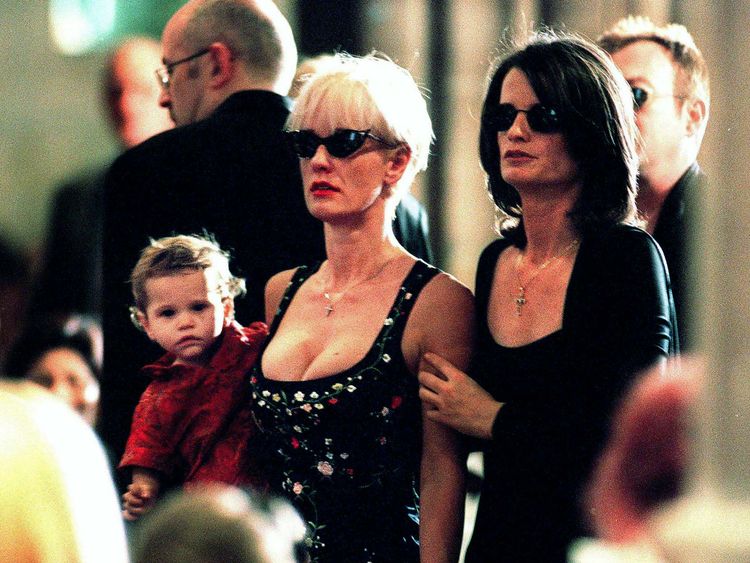 Paula Yates holds Tiger Lily at Hutchence's funeral in Sydney