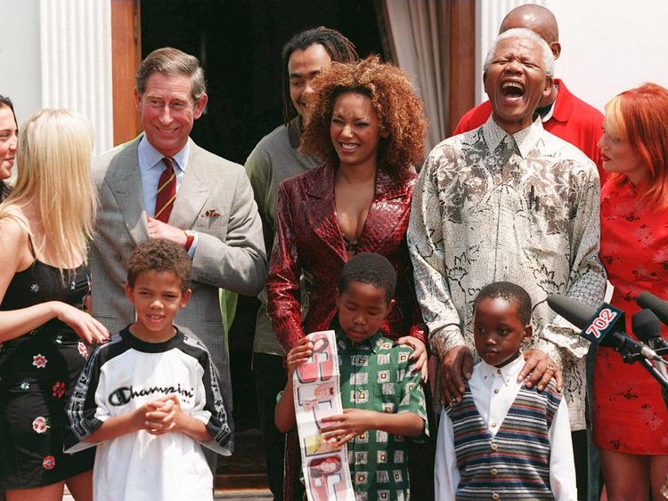 With Nelson mandela and Prince Charles in 1997