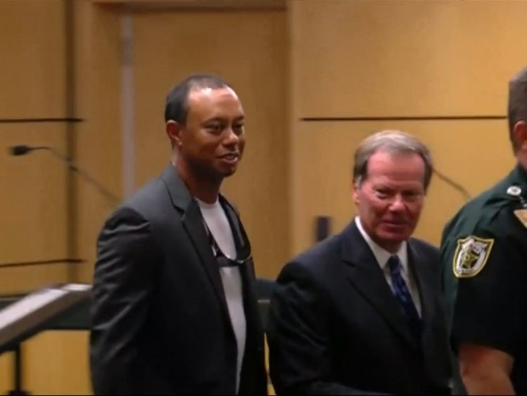 Woods in the court room following the ruling