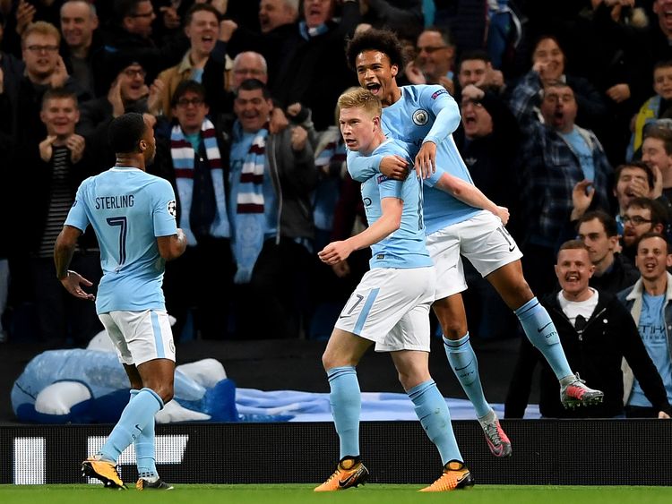 Man City celebrates Sterling's opening goal