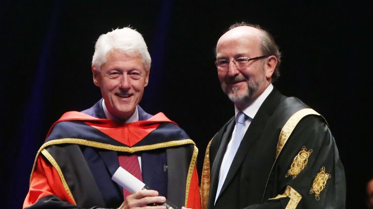 Former US president Bill Clinton receives an honorary doctorate from Dublin City University president Brian MacCraith