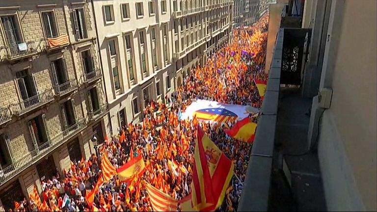 Thousands of people in Barcelona marched to support staying with Spain