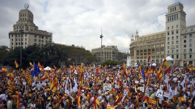 Protesters wave Spanish and Catalan flags in Barcelona 