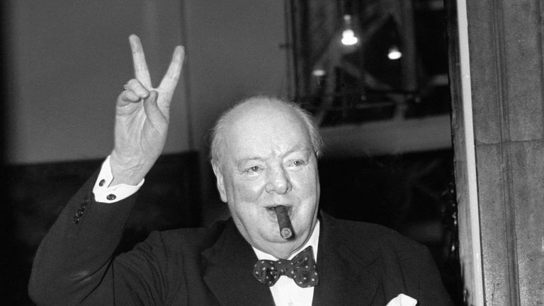 Sir Winston Churchill gives his familiar &#39;V&#39; sign after a lunchtime meeting with American Secretary of State John Foster Dulles. 17-Sep-1954
