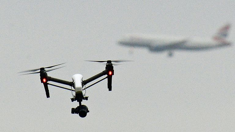 A drone flies near Heathrow. File pic