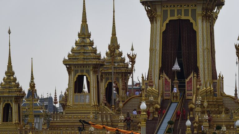 The funeral urn is taken up to the crematorium