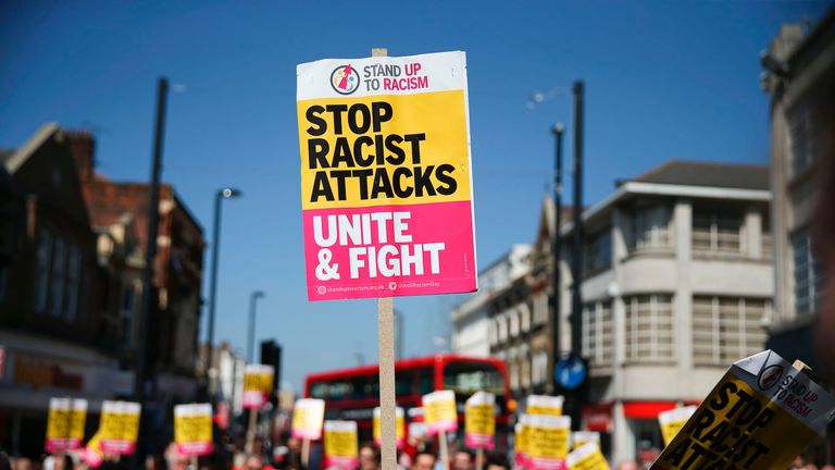 Demonstrators during a protest called by the &#39;Stand Up To Racism&#39; group in Croydon, London, on April 8 2017 following a suspected hate crime attack on a Kurdish Iranian asylum-seeker