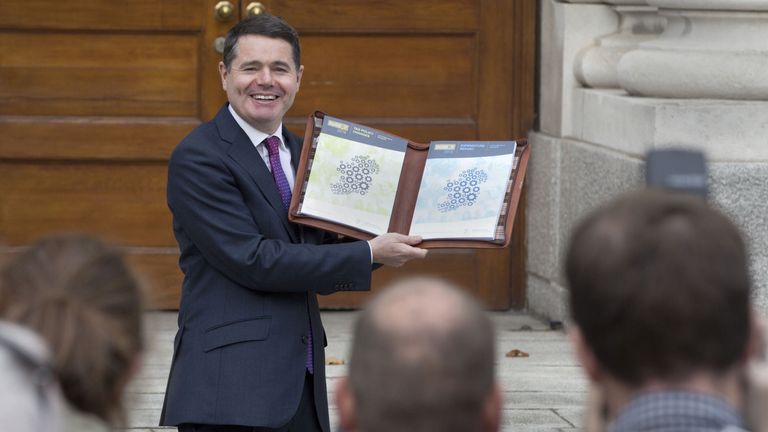 Irish Finance Minister, Paschal Donohoe with a copy of Ireland's 2018 budget