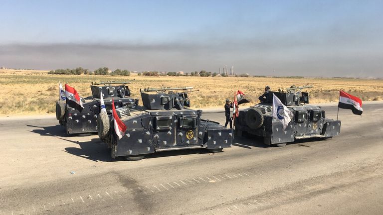 Members of Iraqi federal forces enter oil fields in Kirkuk