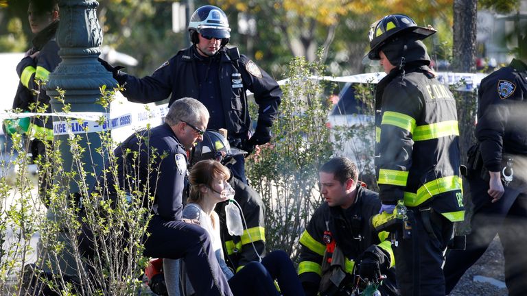 Woman being treated by first responders in New York after a terror attack 