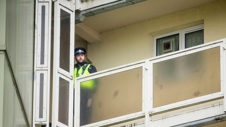 A police officer on a balcony at Newcastle House            