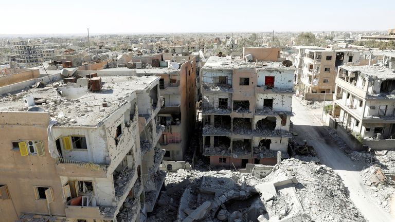 Destroyed buildings in a residential district on Raqqa&#39;s front line