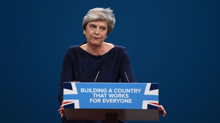 MANCHESTER, ENGLAND - OCTOBER 04: British Prime Minister Theresa May delivers her keynote speech to delegates and party members on the last day of the Conservative Party Conference at Manchester Central on October 4, 2017 in Manchester, England. The prime minister rallied members and called for the party to &#39;shape up&#39; and &#39;go forward together&#39;. Theresa May also announced a major programme to build council houses and a cap on energy prices. (Photo by Carl Court/Getty Images)
