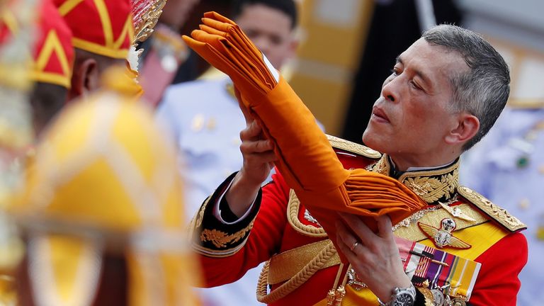 Thailand's King Maha Vajiralongkorn takes part in the royal cremation procession