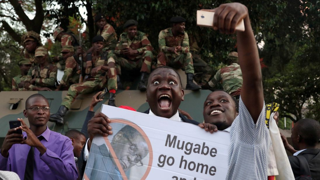 Image result for zimbabwe president resign celebrates