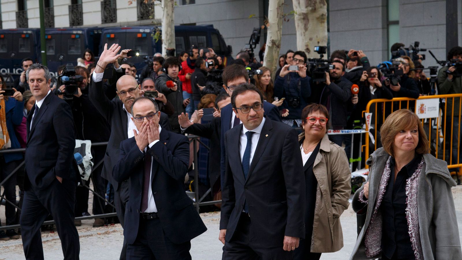 Ousted Catalan leader Puigdemont urges peaceful protest as 'arrest ...