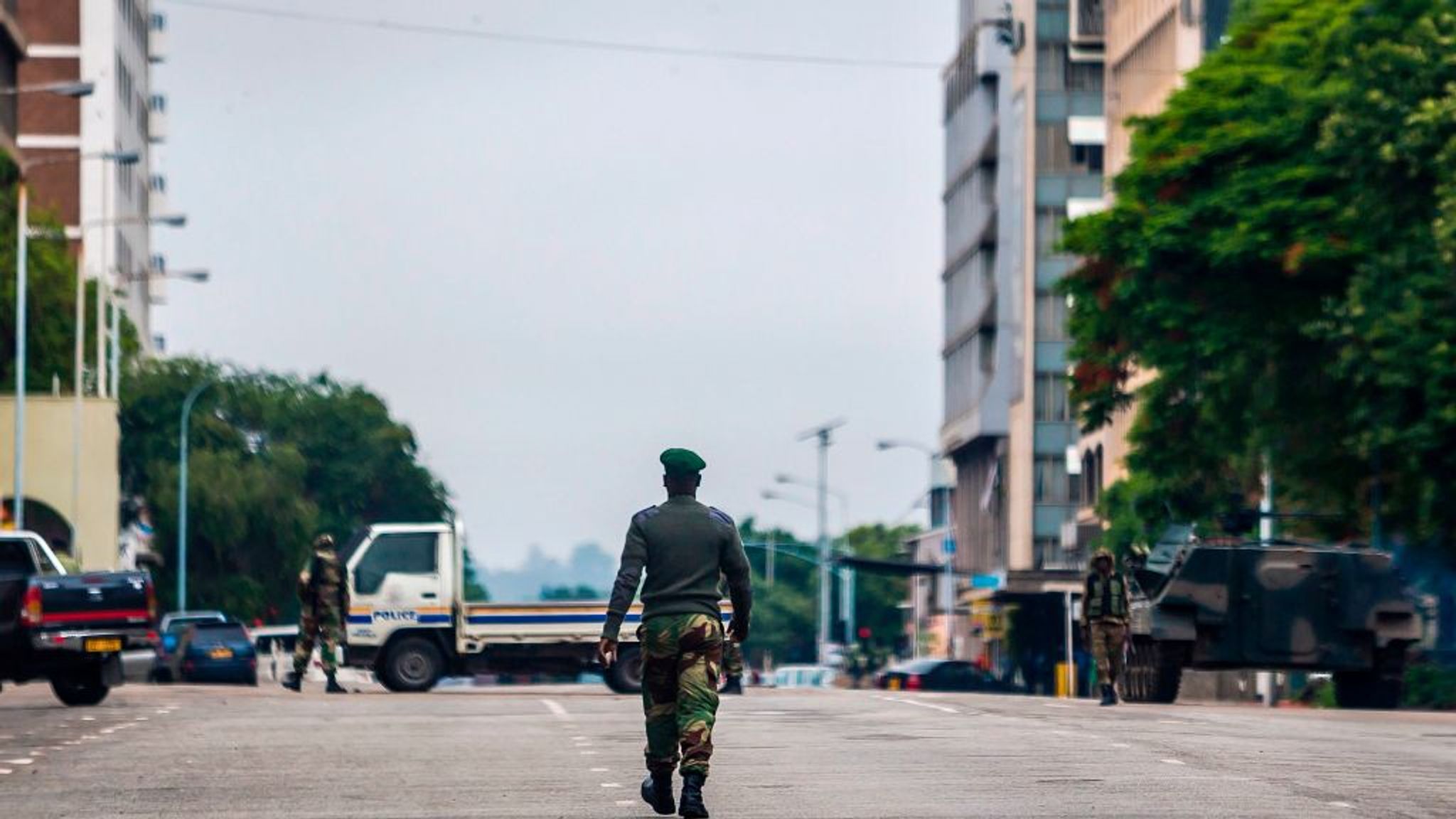 'We sped off' to avoid heavily-armed troops in Zimbabwe's tense capital