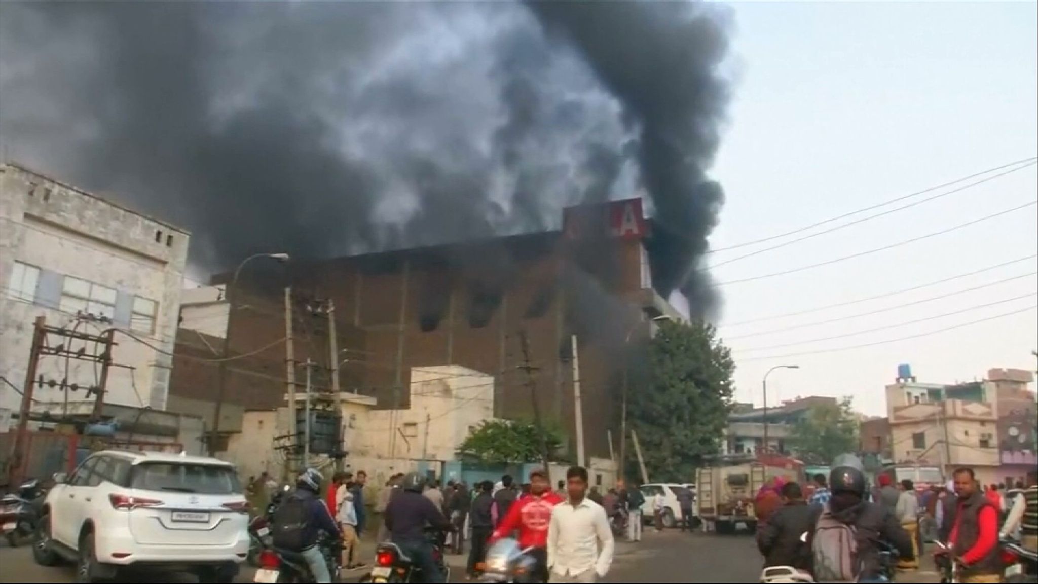 'At least three dead' and more missing after factory collapses in India