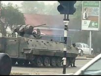 Military vehicles and soldiers patrol the streets in Harare, Zimbabwe