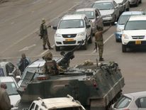 Military vehicles and soldiers patrol the streets in Harare, Zimbabwe