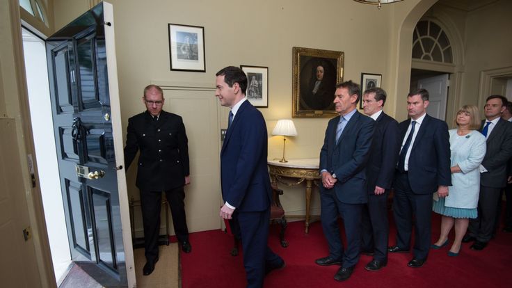 Chancellor George Osborne leaves to deliver his 2015 Budget