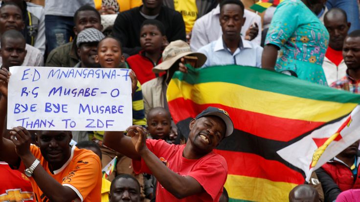   People wait for the inauguration ceremony of the next president of Zimbabwe Emmerson Mnangagwa 