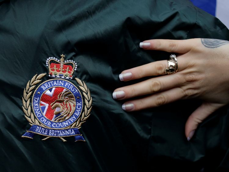 A supporter wears a Britain First logo during a rally in Rochester in 2014