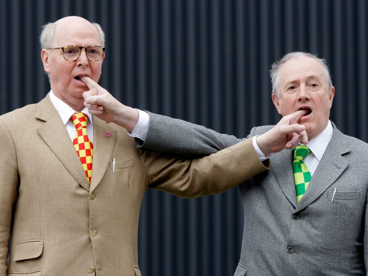 Gilbert & George pose for the cameras at the opening of a previous exhibition in Berlin