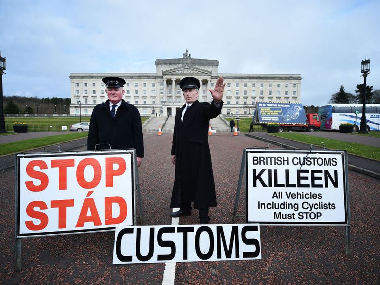 BELFAST, NORTHERN IRELAND - MARCH 29: Two men dressed as customs officers take part in a protest outside Stormont against Brexit and it&#39;s possible effect on the north and south Irish border on March 29, 2017 in Belfast, Northern Ireland. British Prime Minister Theresa May will address the Houses of Parliament later today as Article 50 is triggered and the process that will take Britain out of the European Union will begin. (Photo by Charles McQuillan/Getty Images)
