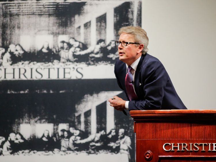 Auctioneer Jussi Pylkkanen takes bids at the auction of Leonardo da Vinci&#39;s &#39;Salvator Mundi&#39; during the Post-War and Contemporary Art evening sale at Christie&#39;s on November 15, 2017 in New York City. The rediscovered masterpiece by the Renaissance master sells for an historic $450,312,500, obliterating the prevous world record for the most expensive work of art at auction. (Photo by Eduardo Munoz Alvarez/Getty Images)