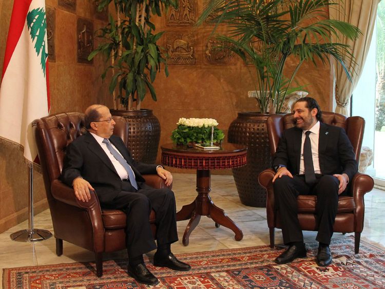 President Michel Aoun (left) meets with newly appointed Prime Minister Saad Hariri in November 2016