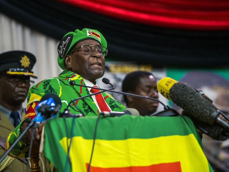 imbabwe&#39;s President Robert Mugabe delivers a speech during a meeting of his party&#39;s youth league where he hinted at a cabinet reshuffle, on October 7, 2017, in Harare