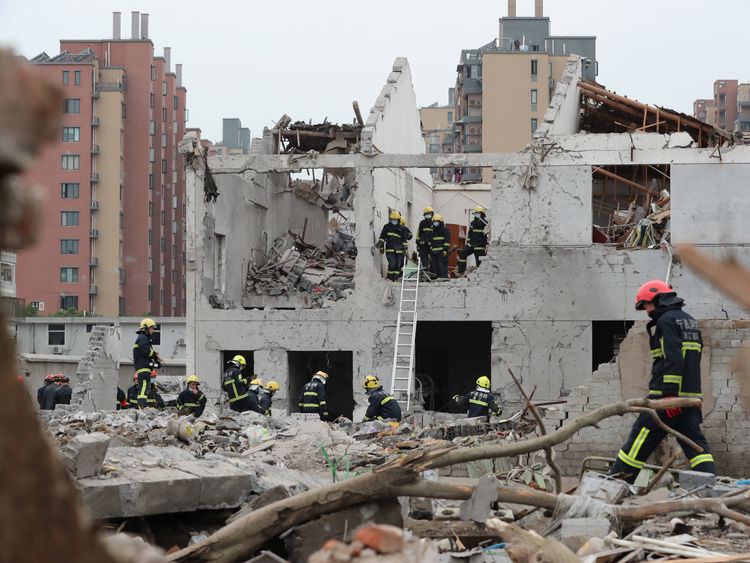 Rescue workers are seen at the site of an explosion in Ningbo, China's eastern Zhejiang province on November 26, 2017