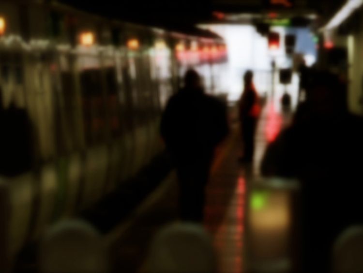 Commuters at a railway station in London