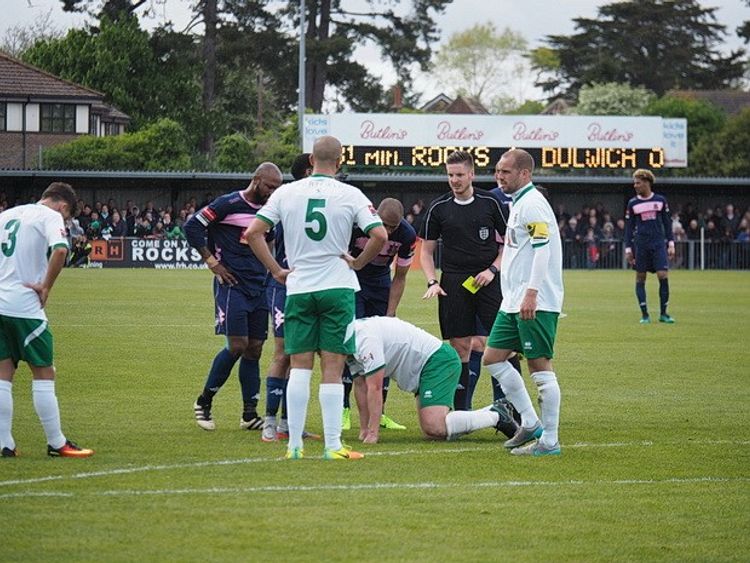 Ryan Atkin refereeing a game of football