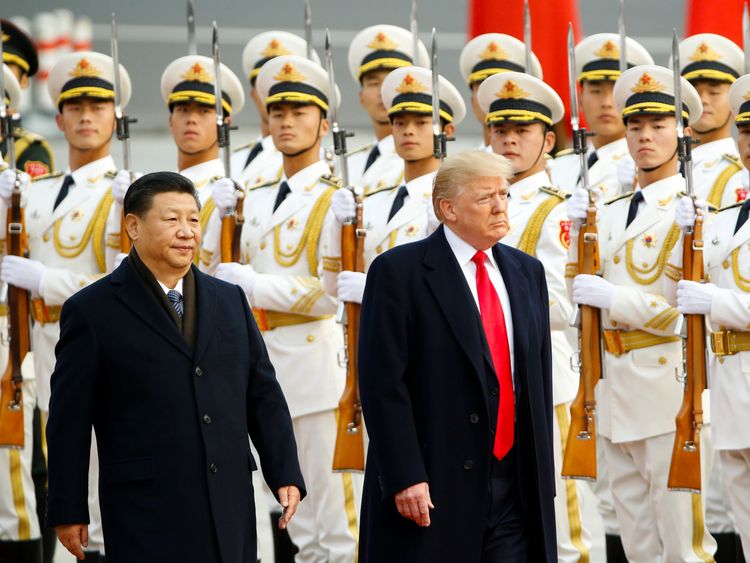 U.S. President Donald Trump takes part in a welcoming ceremony with China&#39;s President Xi Jinping in Beijing, China, November 9, 2017