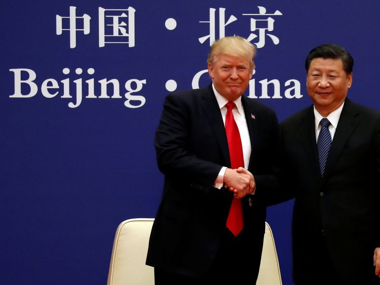 U.S. President Donald Trump and China&#39;s President Xi Jinping meet business leaders at the Great Hall of the People in Beijing, China, November 9, 2017